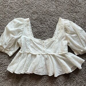 Never worn free people baby doll top. Size medium.